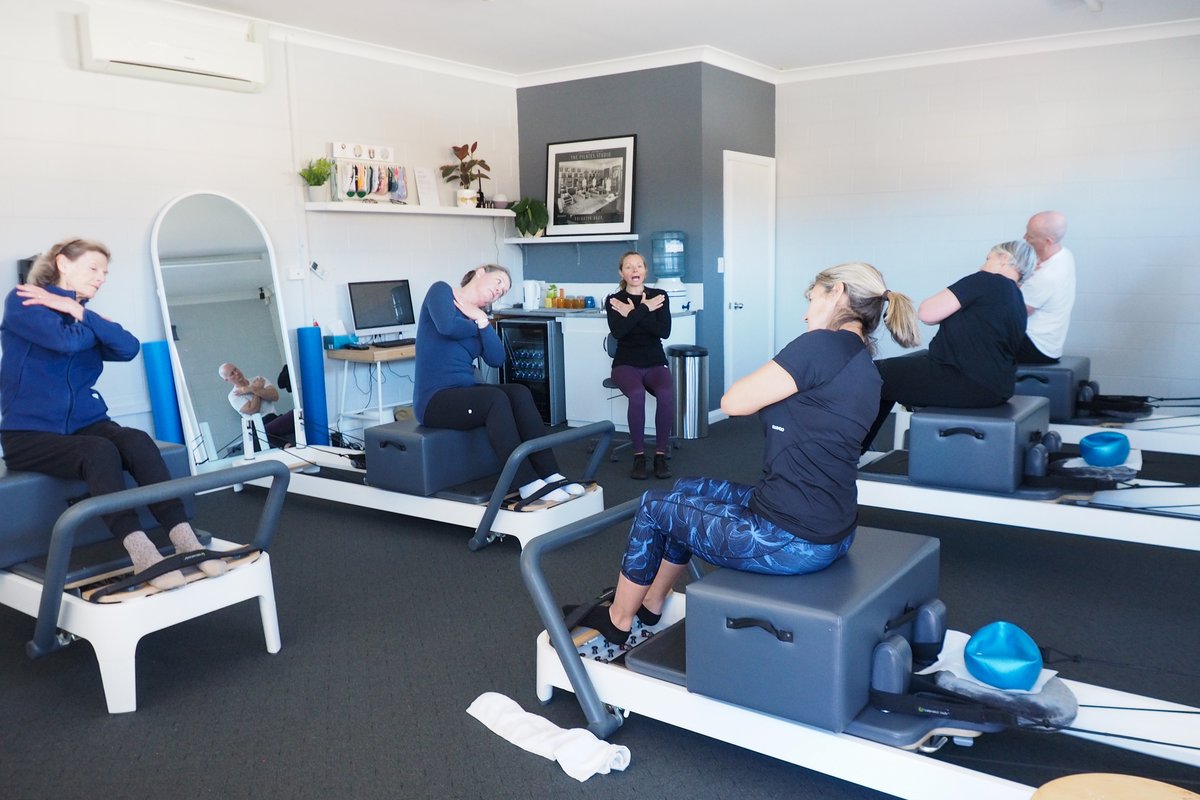 Jules Ott teaching a private Pilates session at her home studio